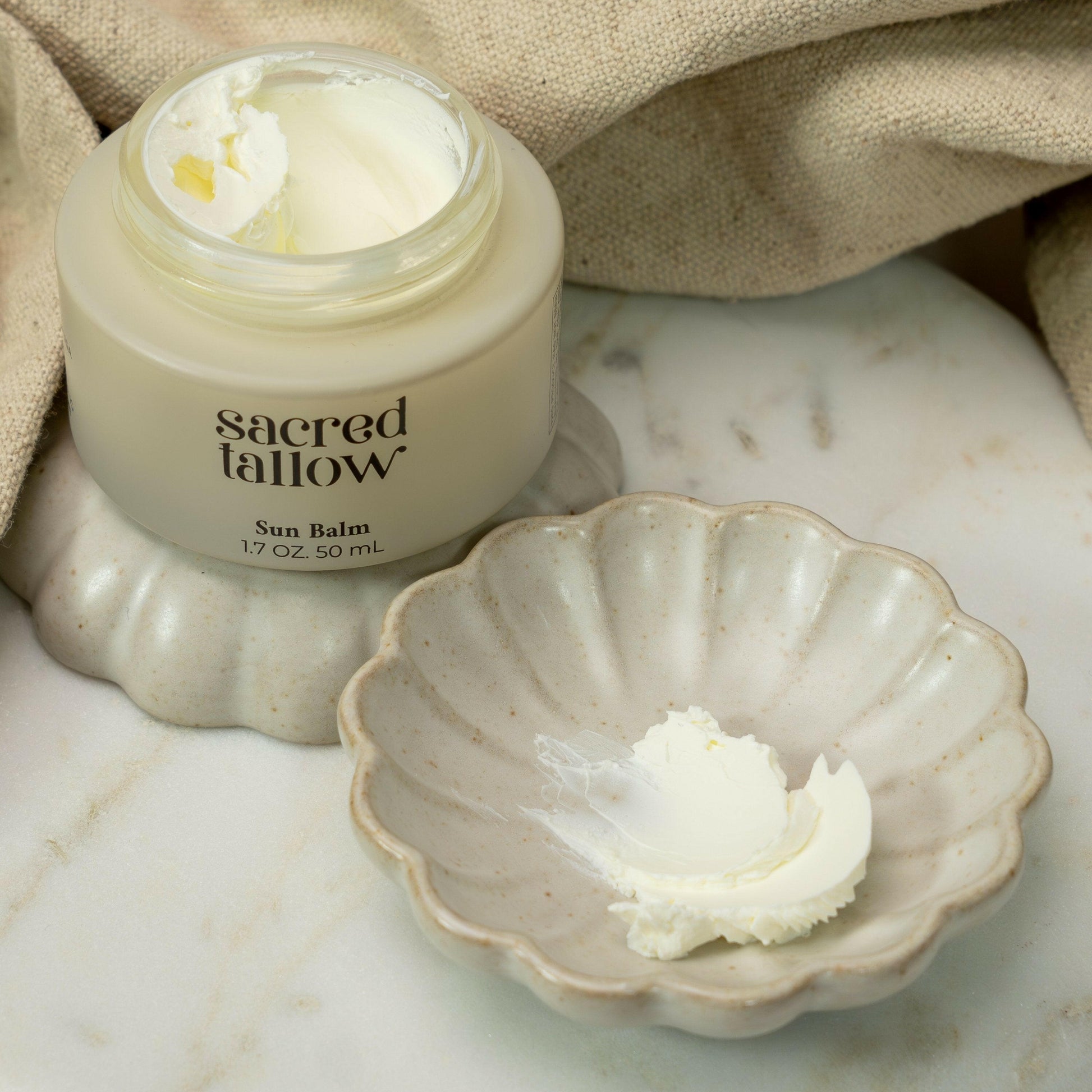 Organic grass-fed tallow sun balm sunscreen providing natural skin protection