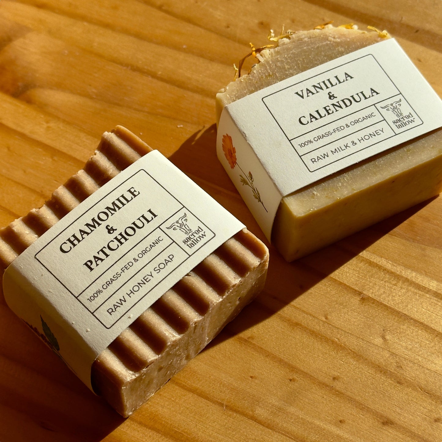 Two bars of soap a wooden surface